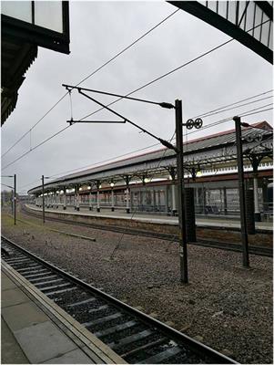 Reliability Quantification of Railway Electrification Mast Structure Considering Buckling